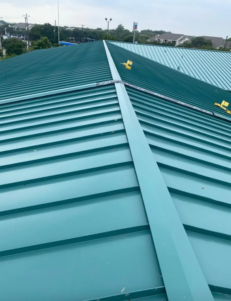 Green commercial metal roof ridge and valley for Metal Roof Repair in Philomath