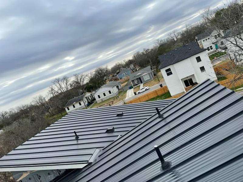 Standing seam metal roof panels with vents for Skylight Repair in Philomath